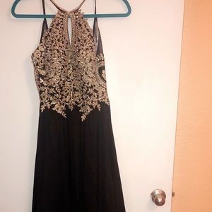 Long black and gold prom dress